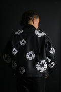 Eclat floral sur cuir noir